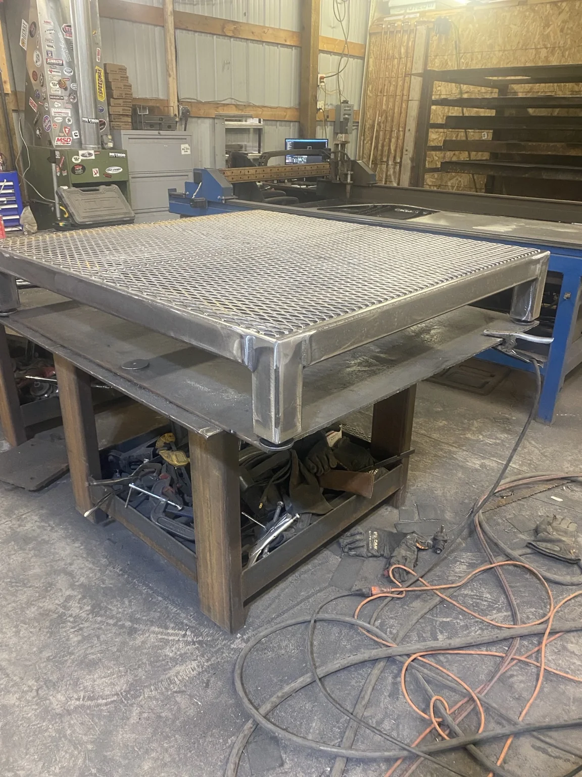 One of four adjustable steel platforms built for 1,000-pound water-treatment equipment loads
