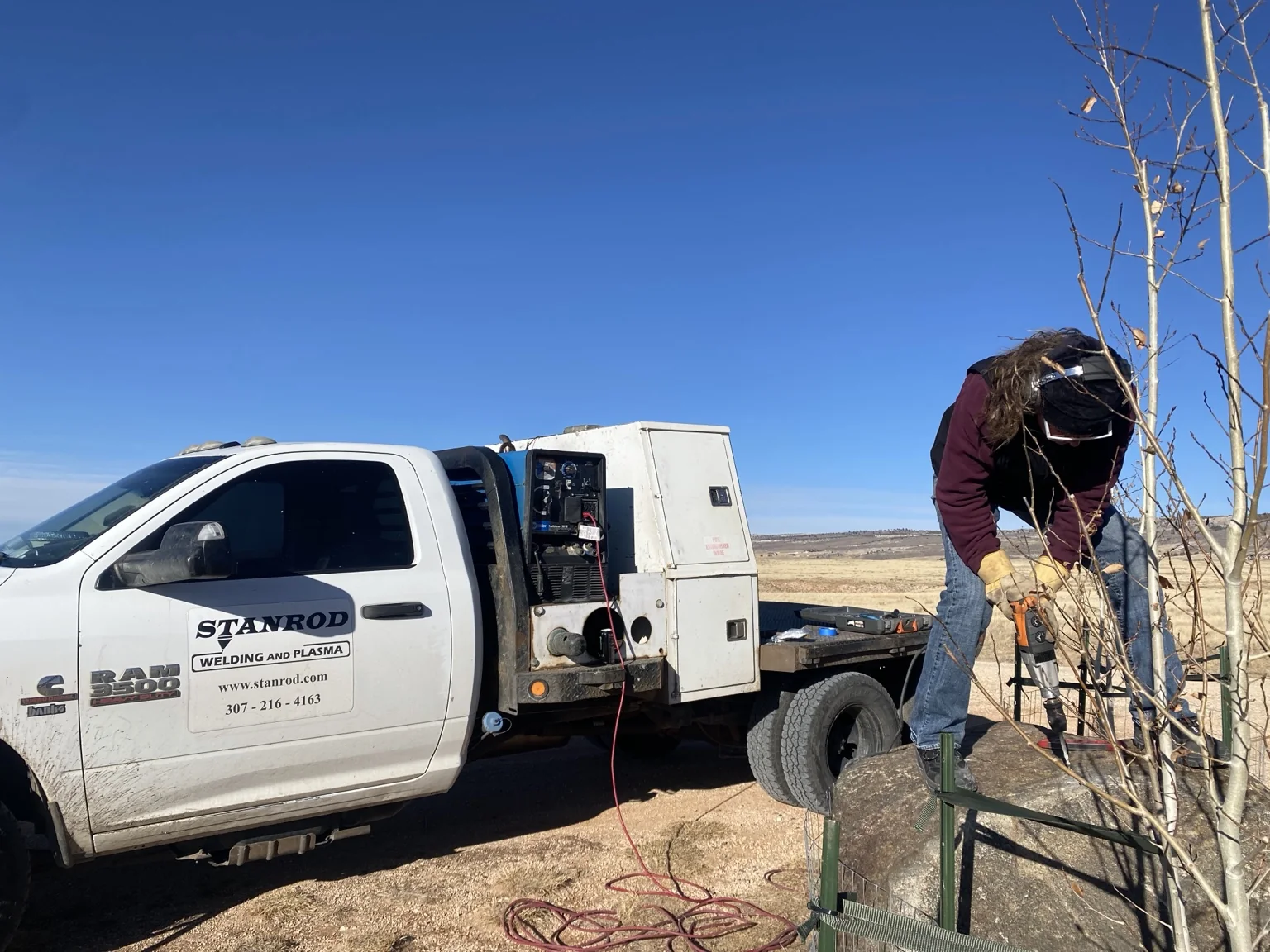 Stanrod mobile rig supporting Black Row Productions during installation of a custom address sign in a boulder