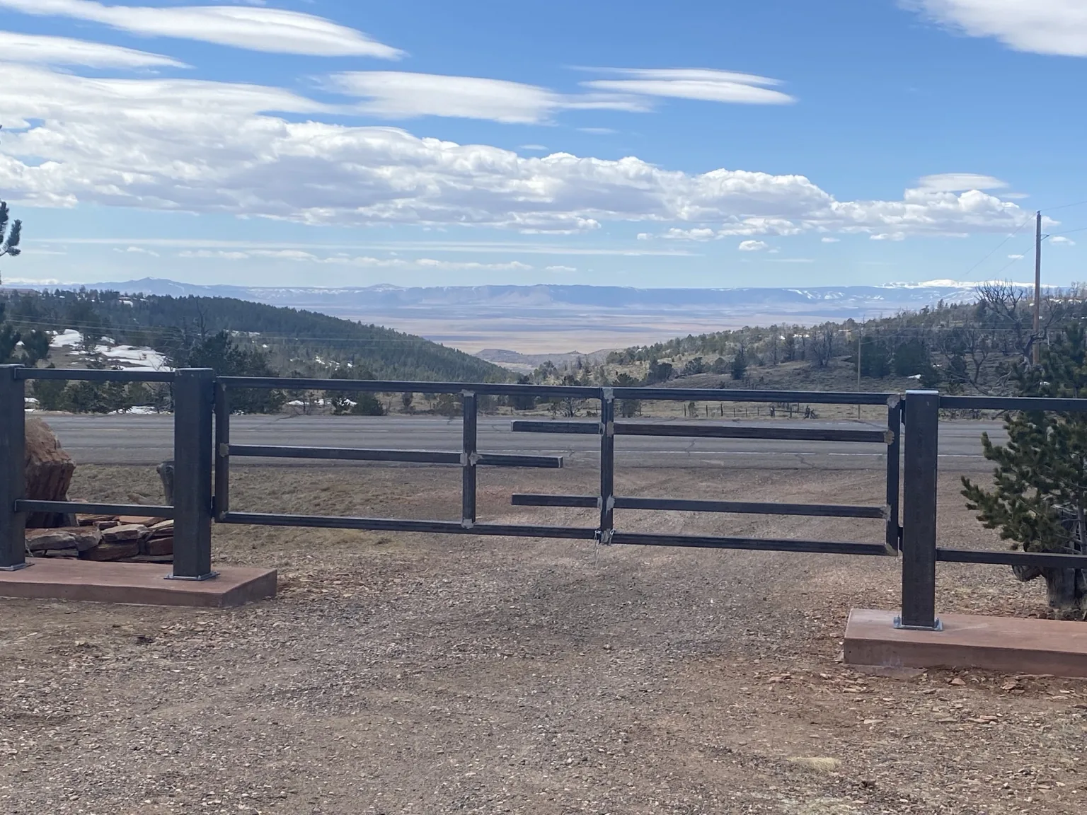 Ranch gate outside Laramie, view 1