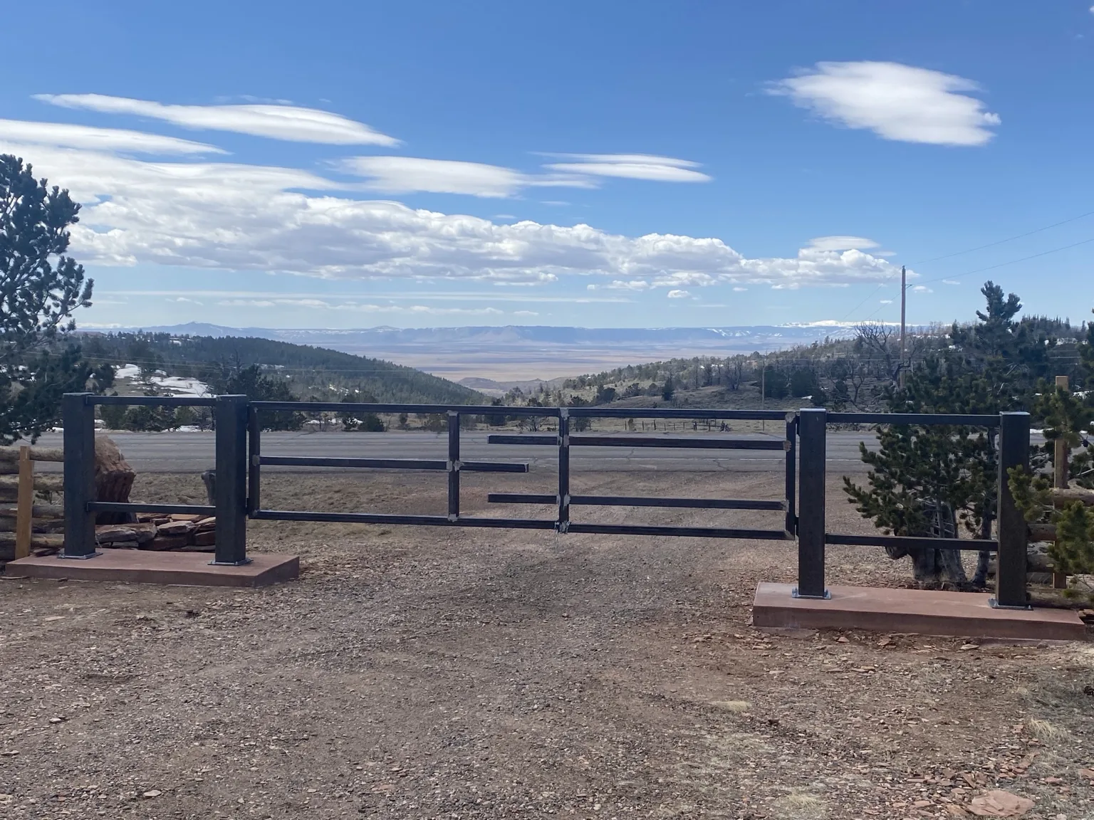 Ranch gate outside Laramie, view 2
