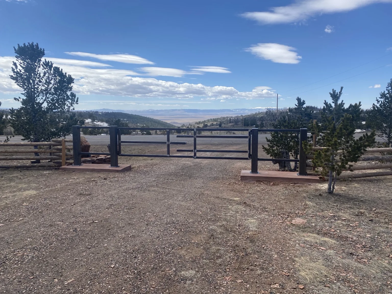 Ranch gate outside Laramie, view 4